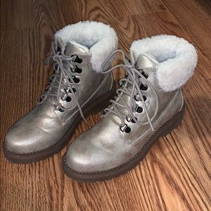 Shiny gold fur-lined combat boots